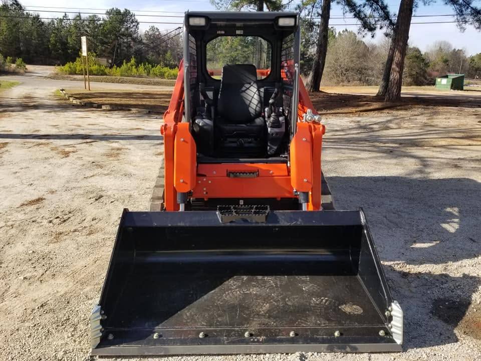 Track loader ready for a grading job